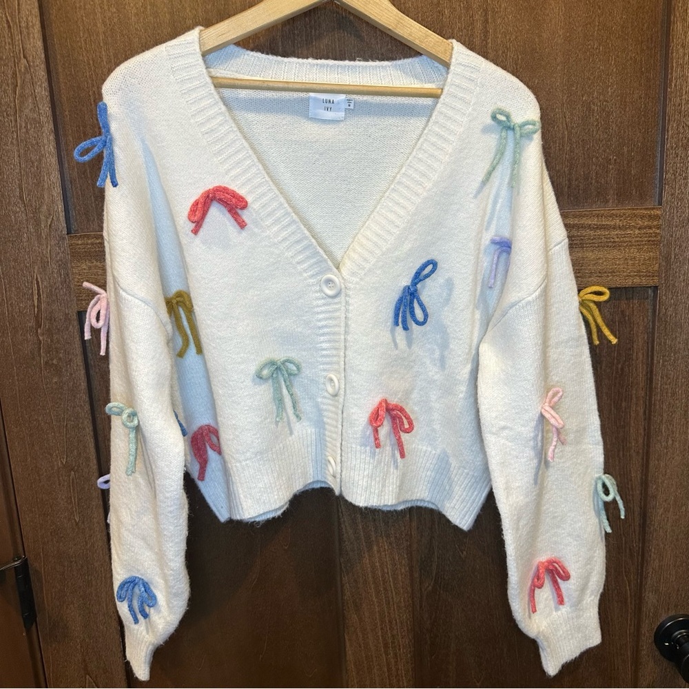 Chic Cream Oversized Cardigan with Multicolor Bow Accents